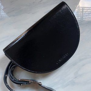 Black patent leather Calvin Klein sling bag